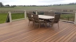 Tan Monument Vinyl Lincoln Rail with Black Round Balusters