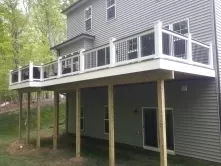 Black Round Balusters and Graphite deck board rail cap attach