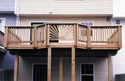 Upper level wood deck with sun ray pattern