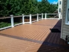 Black Round Balusters on this Cabin Brown Deck