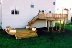 Treated deck with lower level and benches
