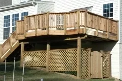 Wood deck with trellis storage area